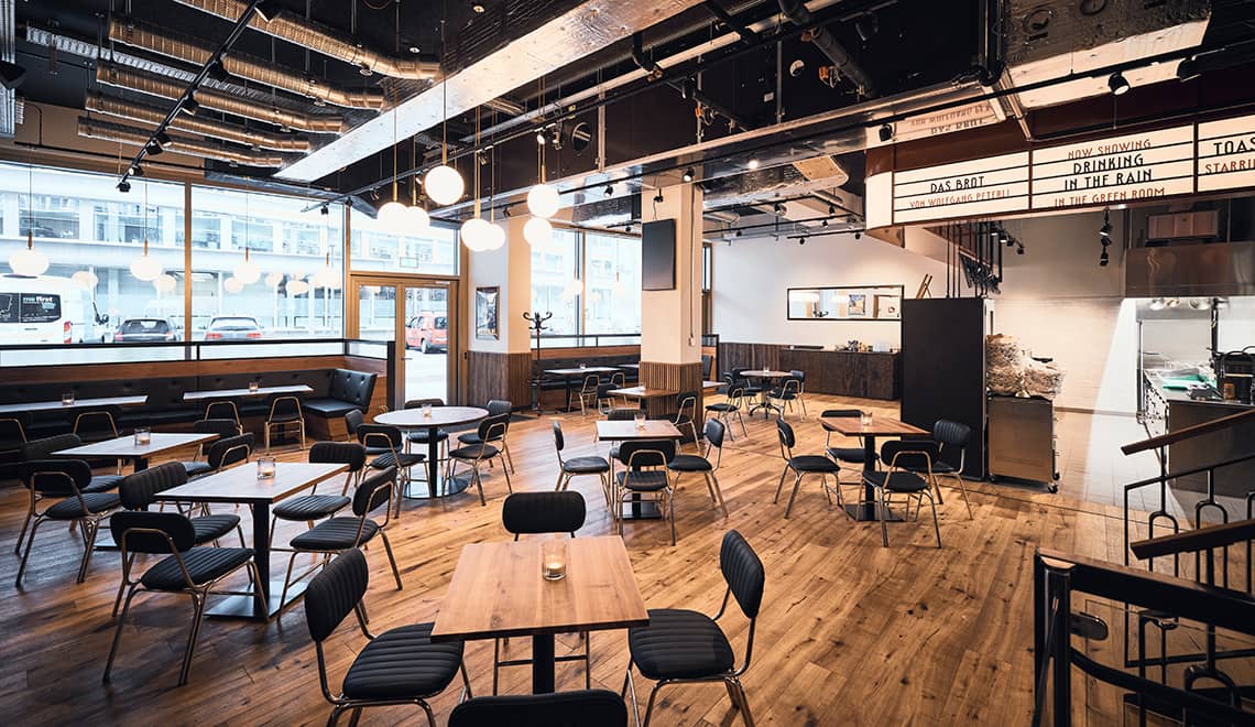 Restaurant d’entreprise au design chaleureux chez Westhive Zurich